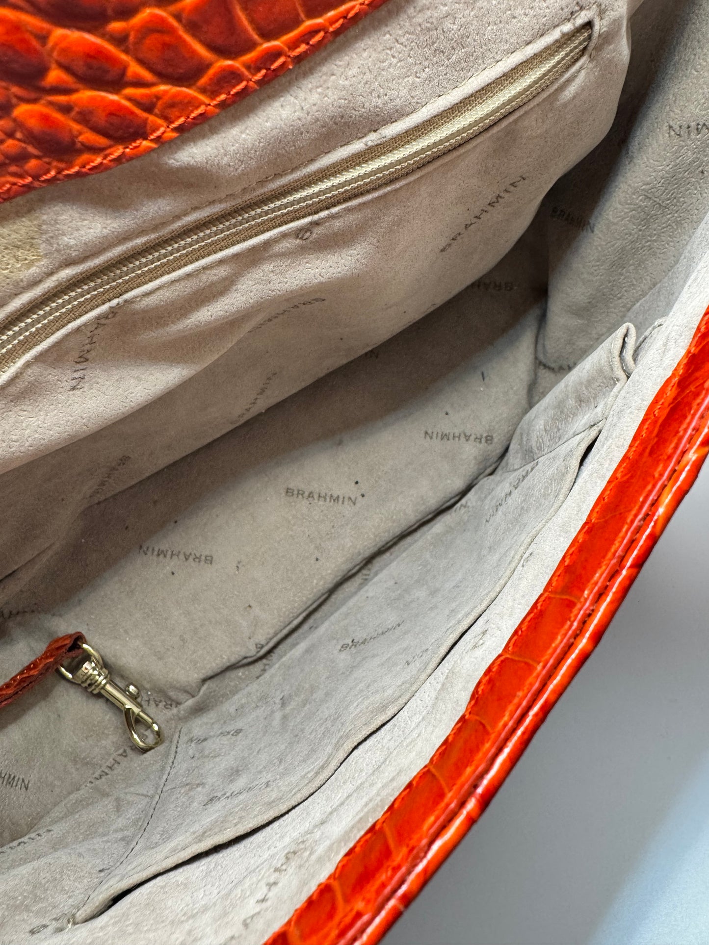 Trend: Brahmmin Orange Embossed Leather Bag