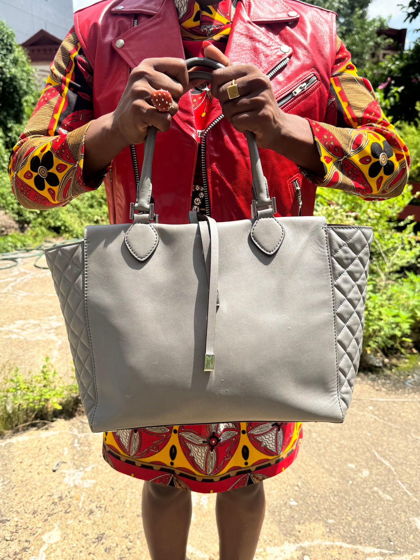 #85. Michael Kors “Miranda” Gray Quilted Bag