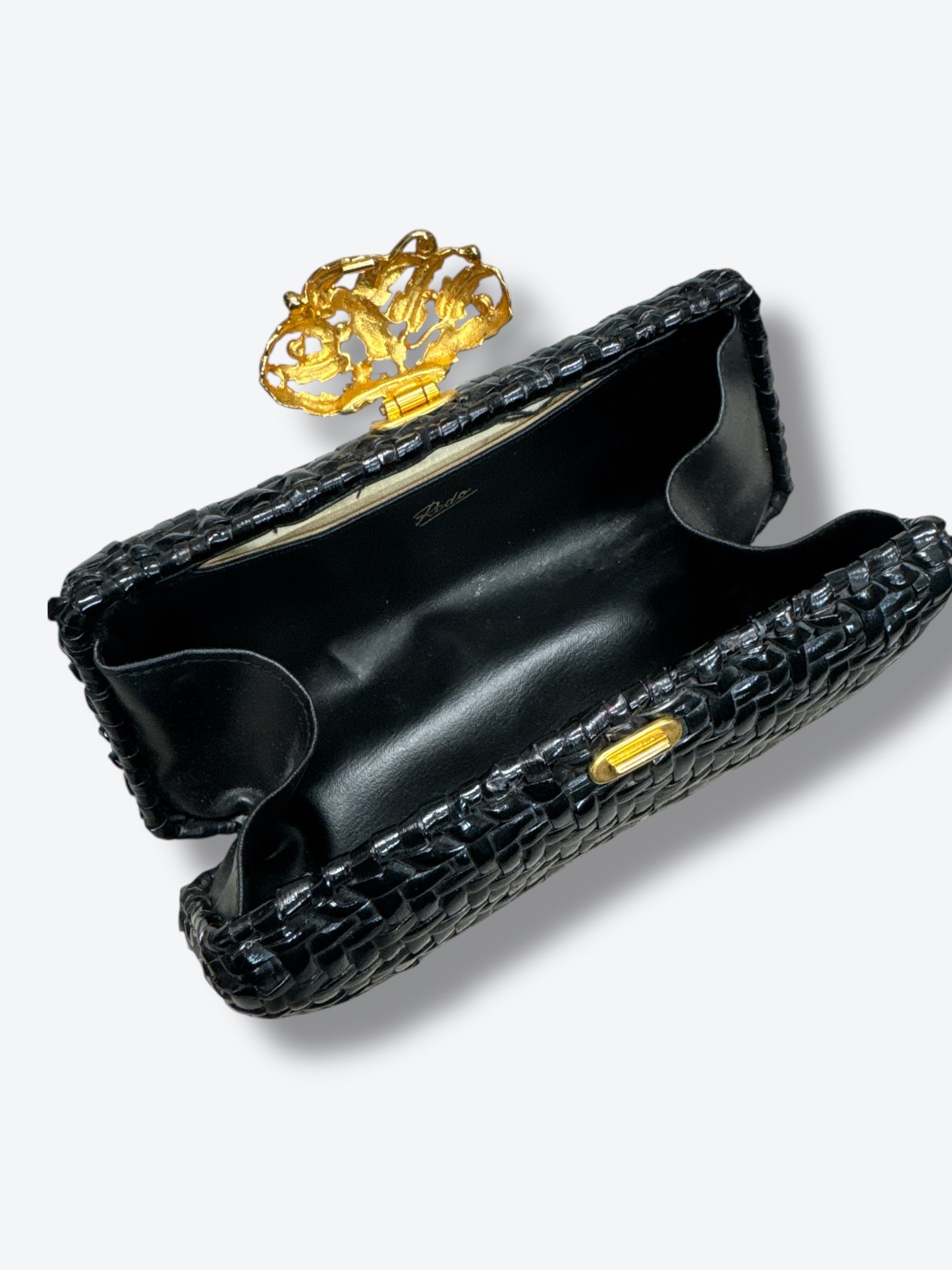 1980s  “Rodo” Black Wicker Clutch with Gold Clasp.
