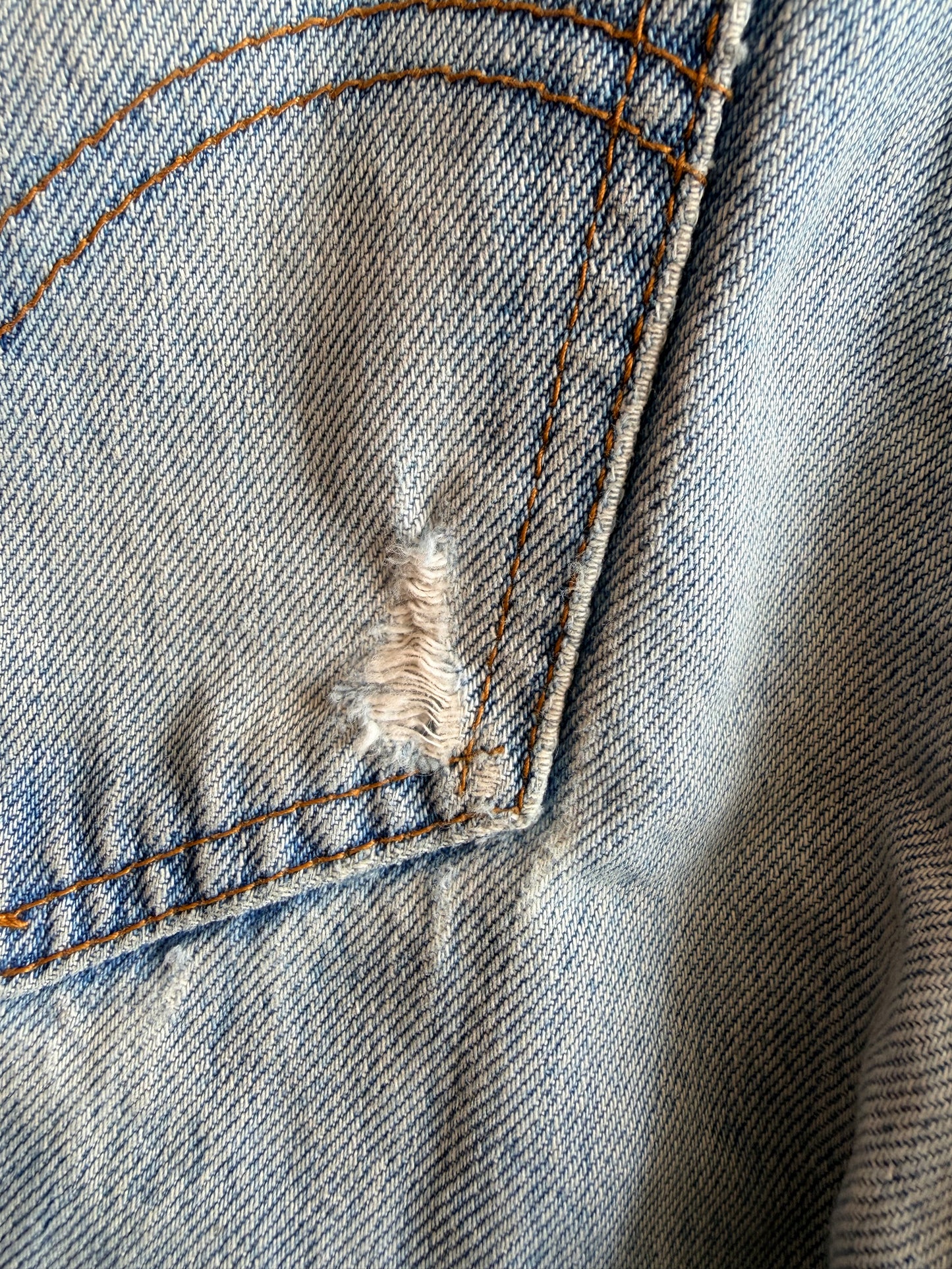 1980s Orange Label Rip + Repair Levi’s (40505 0214)