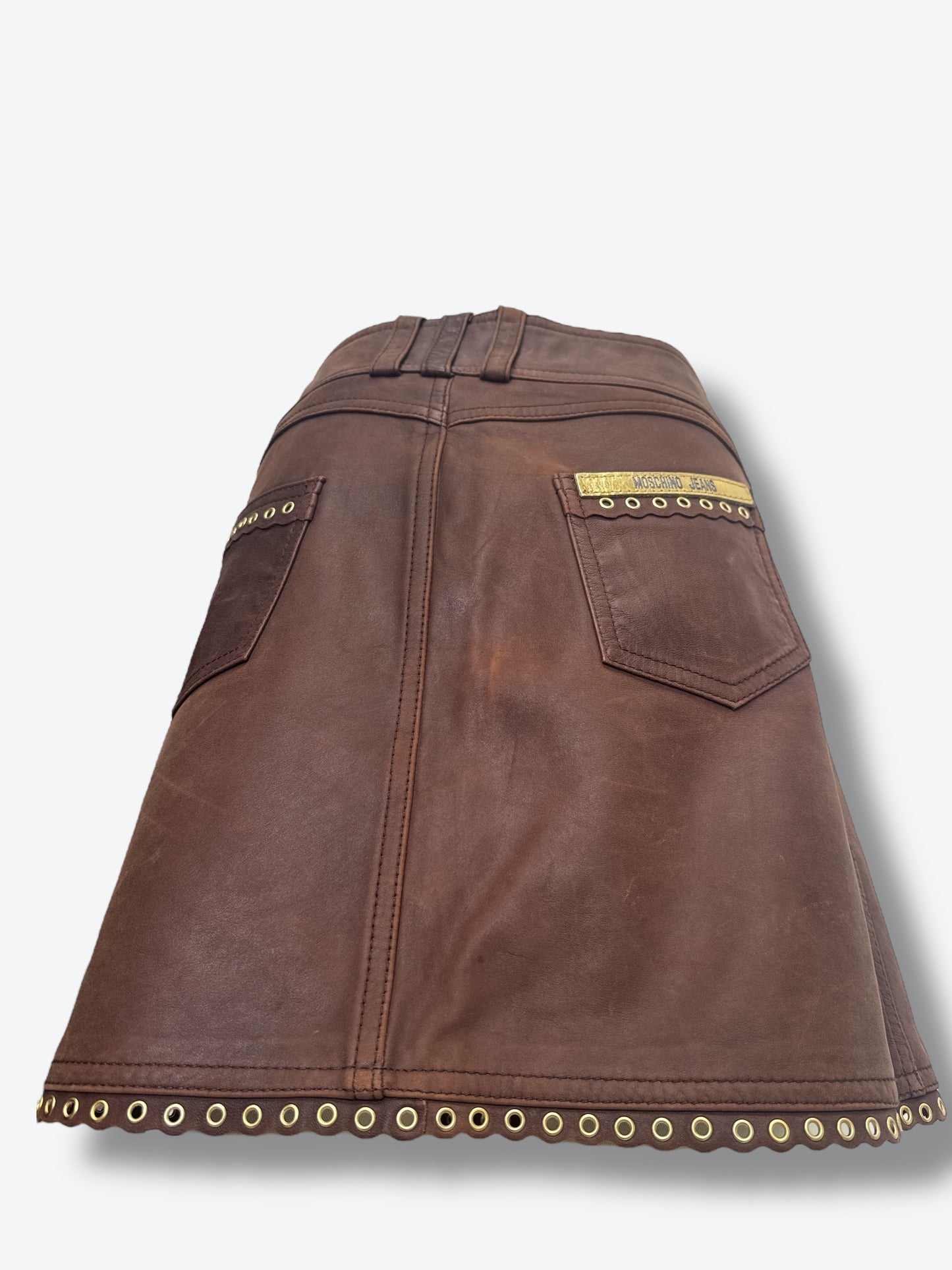 #19. Y2K Moschino Brown Leather Grommet Buckle Mini Skirt