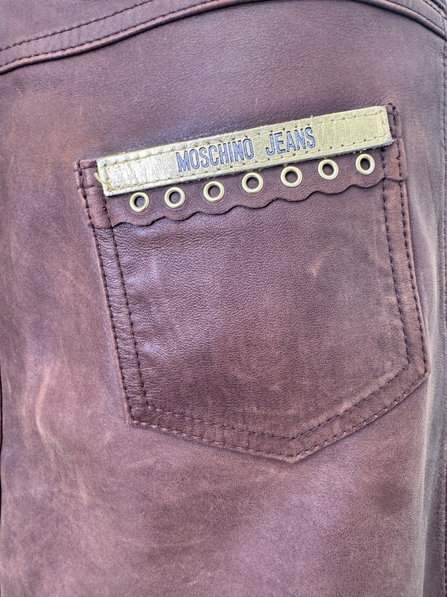 #19. Y2K Moschino Brown Leather Grommet Buckle Mini Skirt