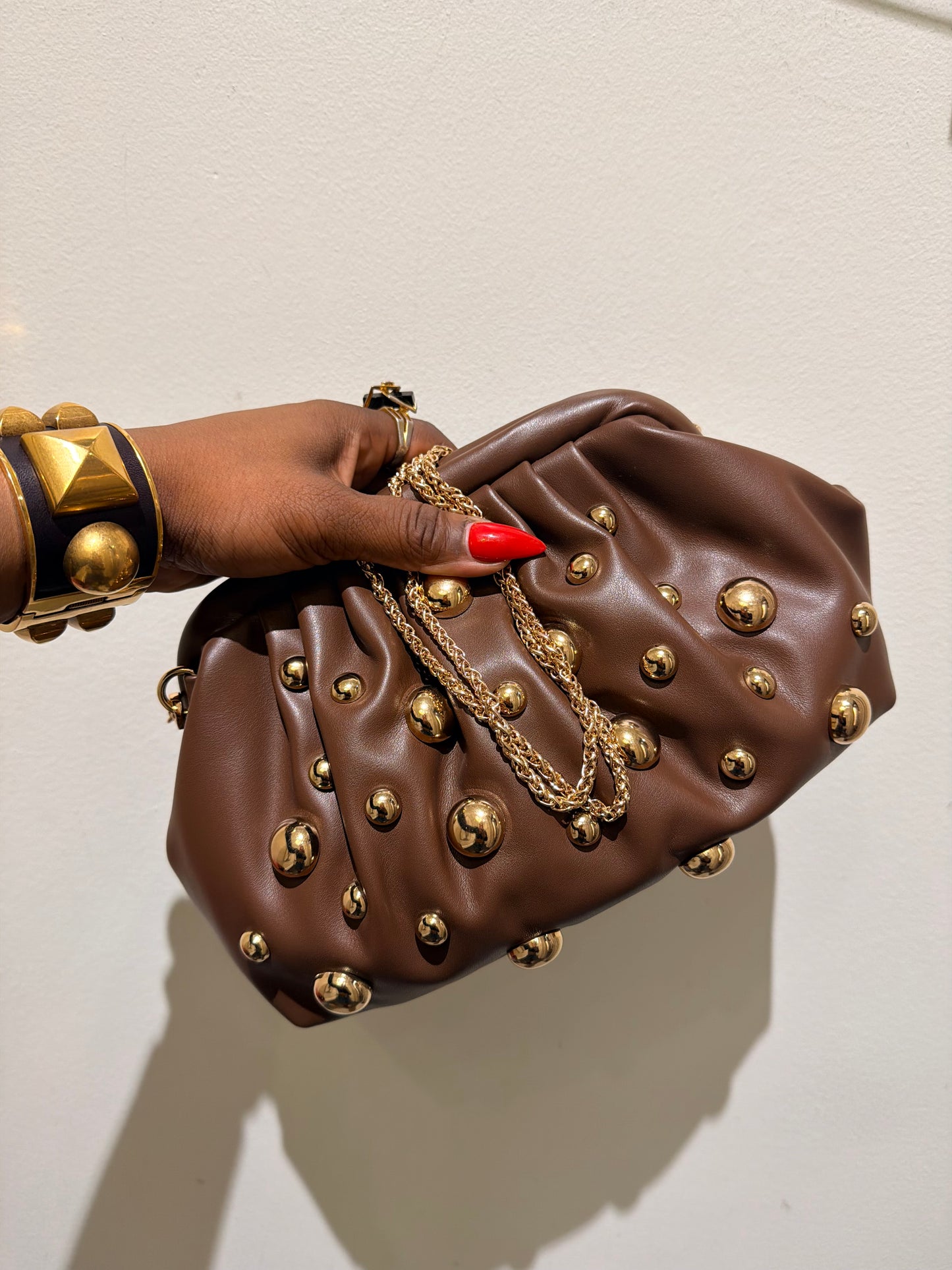 Trend: Gold Beaded Grommet Vegan Leather Bag