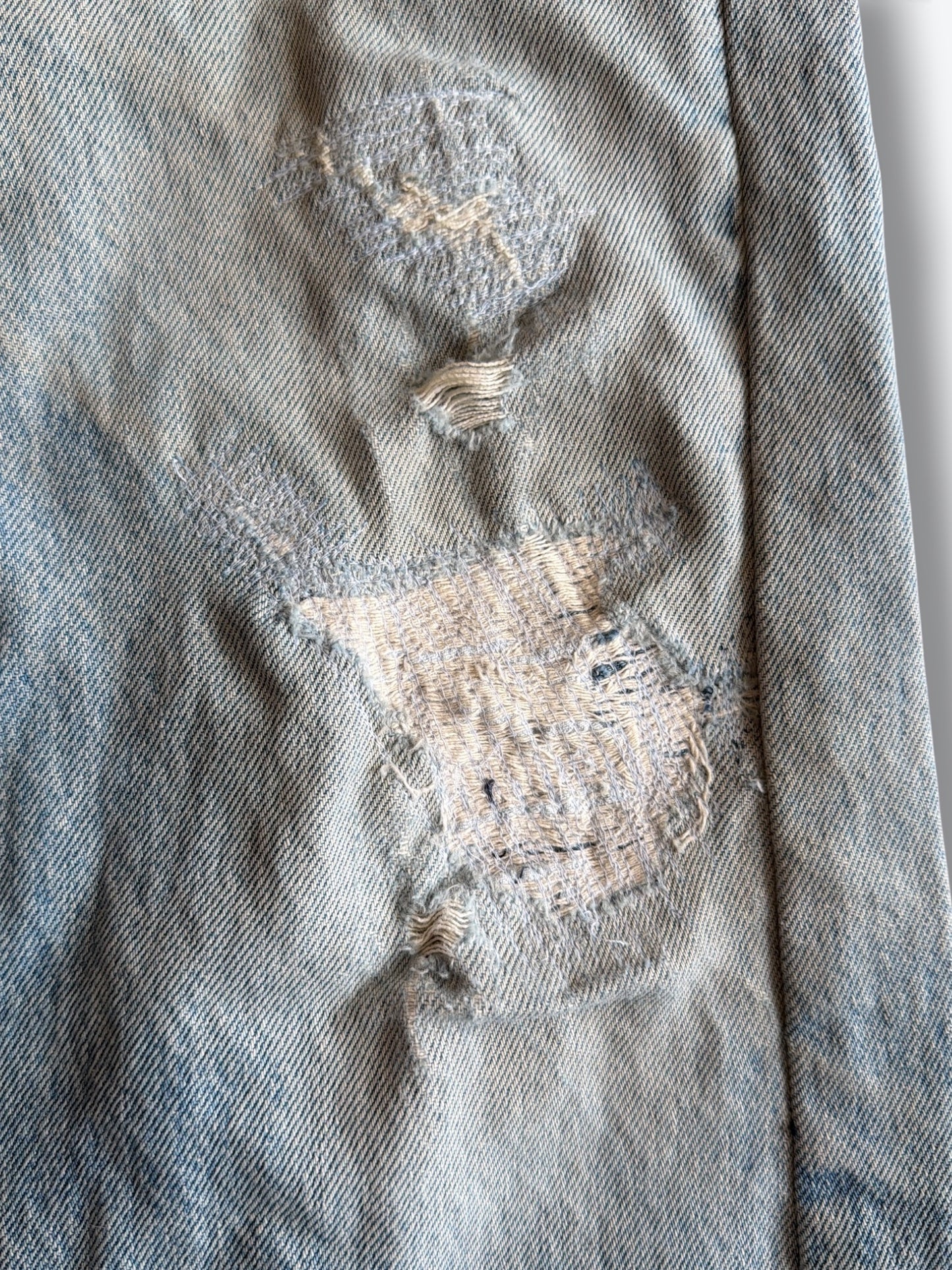 1980s Orange Label Rip + Repair Levi’s (40505 0214)