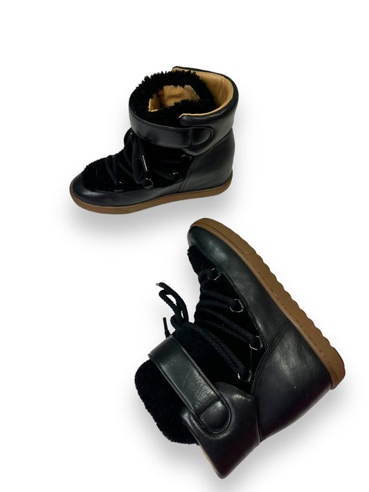 Trend: Coach Kiss Lock Shearling Boots