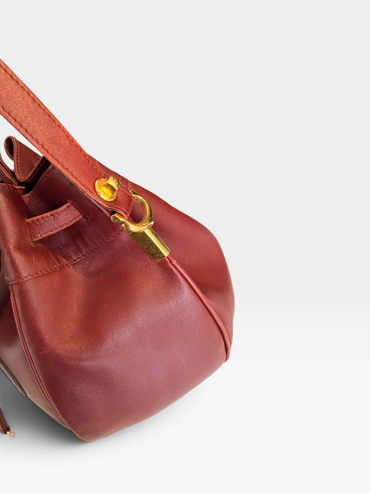 1980s Oxblood Cartier Drawstring Bucket Bag