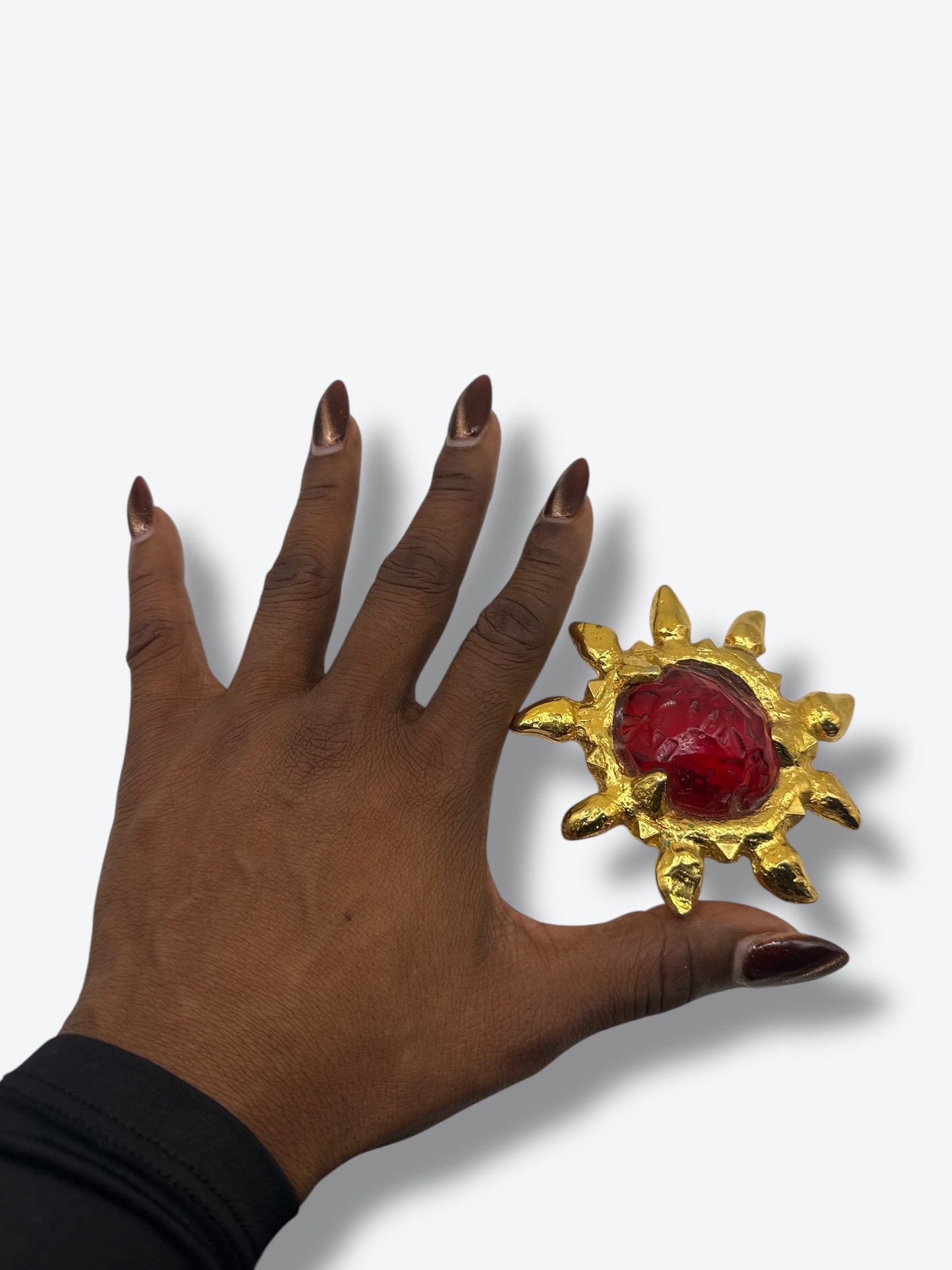 1980s Gilded Sunburst Brooch with Ruby Glass Center